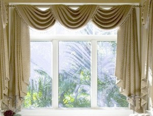 Dazzling window curtains make small space home delightful.