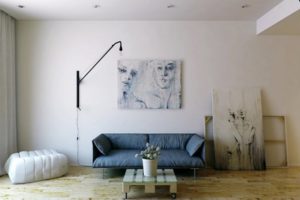 Small light lamp above sofa in living room