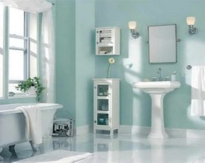 White wooden shelves for keeping amenities in bathroom