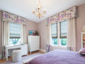 Attractive purple walls, curtain in bedroom