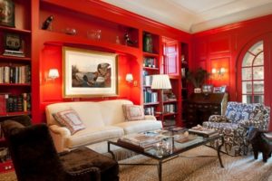 Delicate living room in red colour